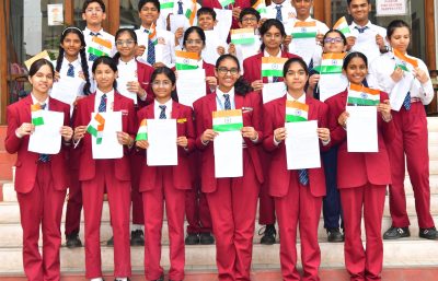 Students with flag and letter 1 new